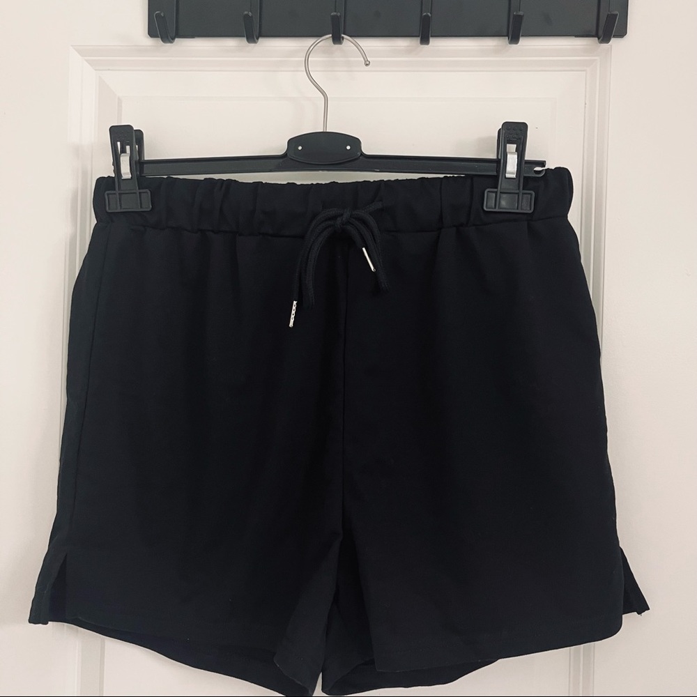 Black jogger drawstring shorts.